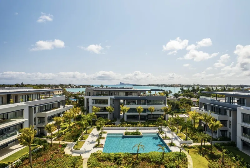 Aerial view of Mont Choisy La Réserve apartments, landscaped pool and lagoon