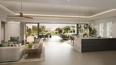 Salon-cuisine ouvert donnant sur la piscine d'une Lagoon Villa La Réserve