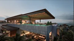 Toiture d'un penthouse Mont Choisy La Réserve et piscine illuminée au crépuscule