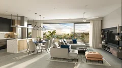 Vaste salon d'un penthouse La Réserve donnant sur une terrasse privée
